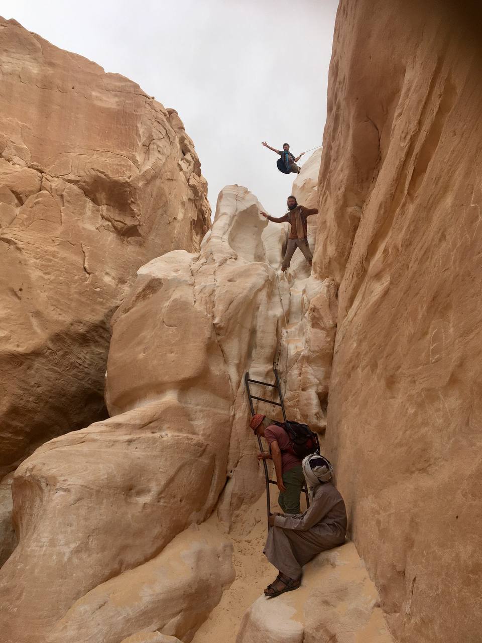 Climbing a canyon with a Bedouin guide