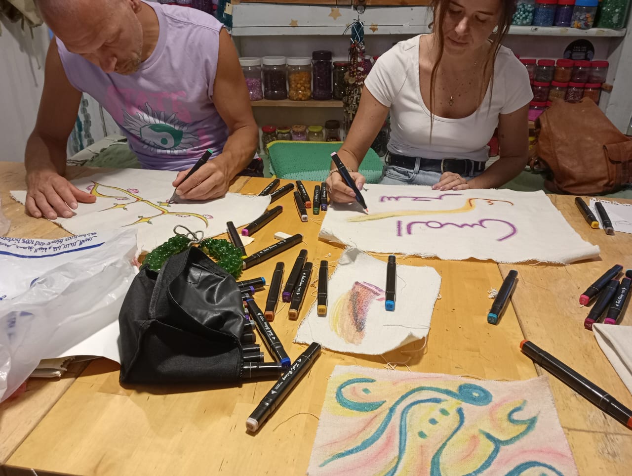 Students in a calligraphy and craft workshop